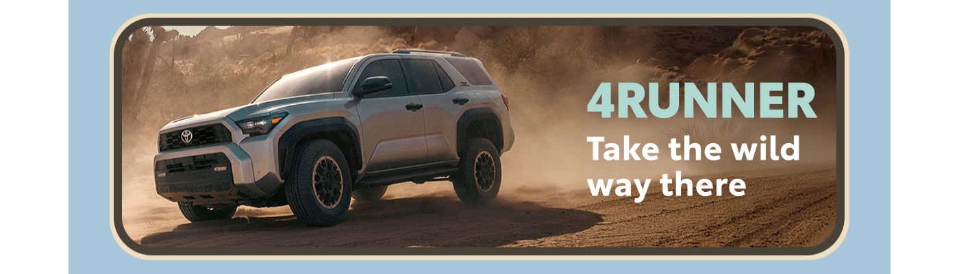 4Runner. Take the wild way there. A silver 4Runner rolls down a dusty desert road dotted with Joshua trees. Explore 4Runner.
